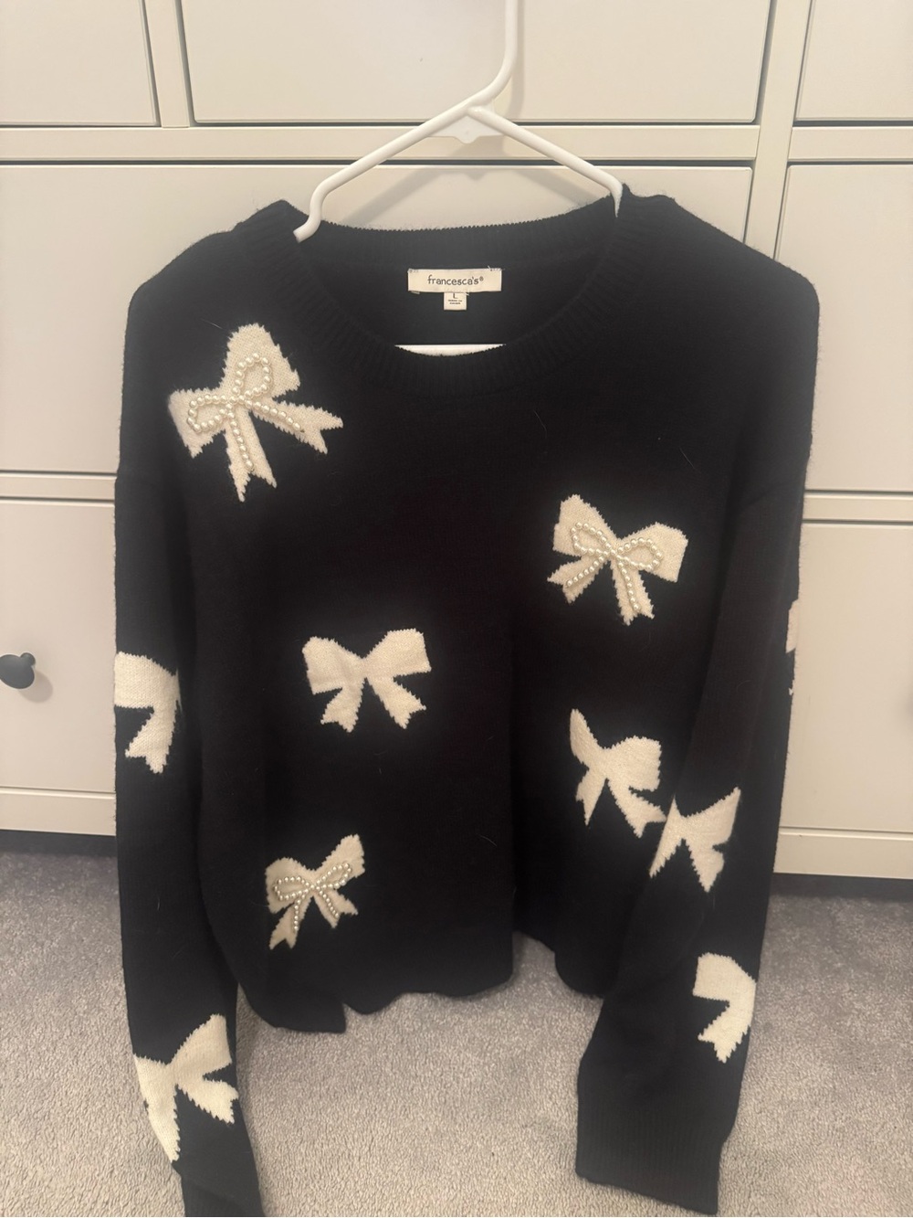 Francesca's Collections Black Sweater with White Bow Accents